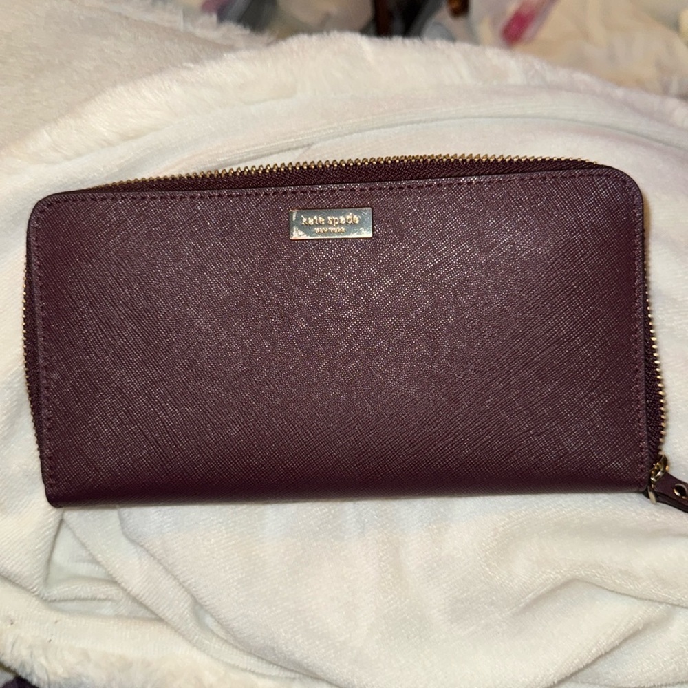 Kate Spade Full Size Zip around wallet-outer flap pocket, inner zipper closure